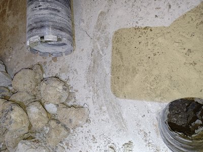 Damage in basement room — visible decay behind walls