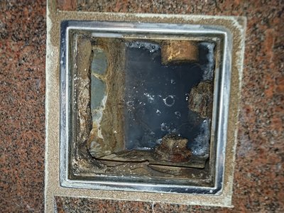 Bathroom floor with damage