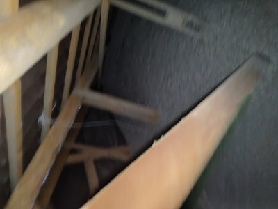 Floor condition documented in the wall