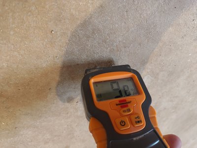 Moisture meter reading at the floor