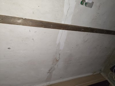 Close-up of structural crack in basement wall
