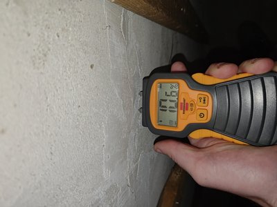 Moisture meter reading at the basement