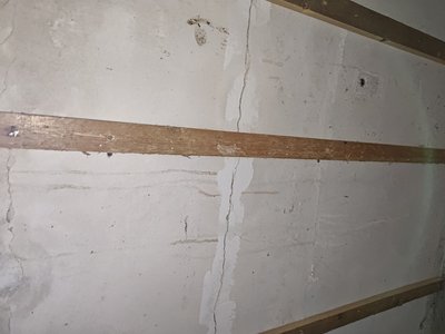 Wall surface with damage in the basement